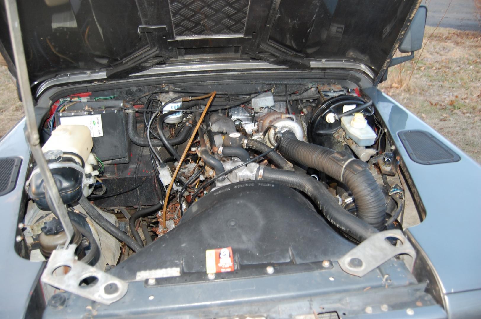 1990 Gray /Black Land Rover Defender (SALLDVAB8FA) with an Diesel engine, 5 speed manual transmission, located at 6528 Lower York Road, New Hope, PA, 18938, (215) 862-9555, 40.358707, -74.977882 - Here is a great running, great looking turn key 1990 Land Rover Defender.....Diesel engine, 5 speed manual transmission, roll up windows, black leather seats, steel wheels, 7.50R60 Silca Come 4x4 tires, fog lights, trailer hitch, Warn Zion 10-S power wynch. The engine has been rebuilt, body and i - Photo#20